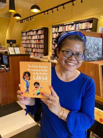 Nazlina at Gerak Budaya Bookstore with the Laksa Book