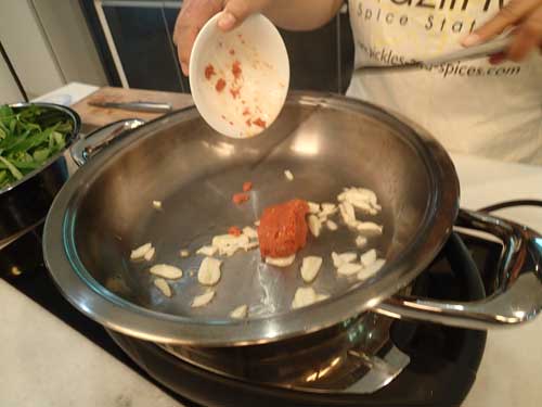 Adding chili paste