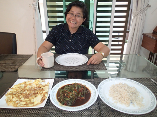 AMC cooking vegetable dish with omelet