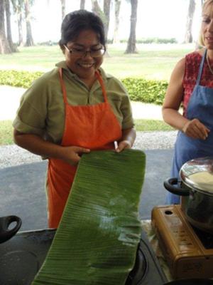 Naz smoking the banana leaves