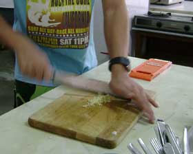 chopping 
		garlic