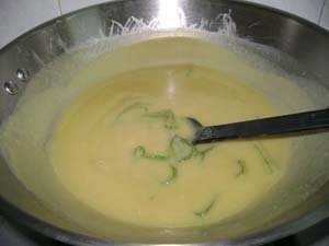 Kaya being stirred on a wok acting as a double boiler